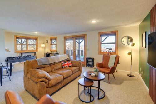 a living room with a couch and a table at Mtn-View Blue Ridge Cabin on Over 2 Acres! in Sparta