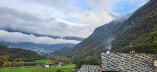 a view of a mountain with a village in the foreground at Casa Estulio in Pontey