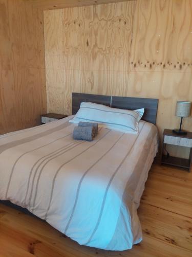 Postel nebo postele na pokoji v ubytování Refugio del Archipielago D3