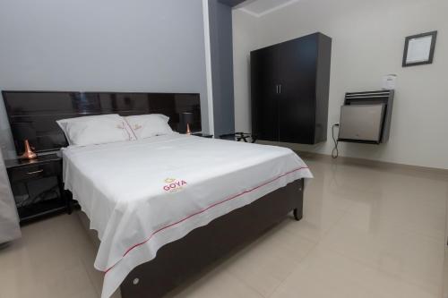 Кровать или кровати в номере GOYA HOTEL