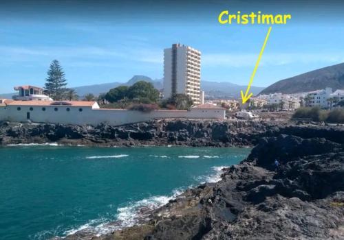 a view of a city from the ocean with a building at Cristimar H23 big pool, 3 bedroom and 3 baths in Los Cristianos