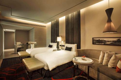 Ένα ή περισσότερα κρεβάτια σε δωμάτιο στο Hilton Xi'an High-tech Zone