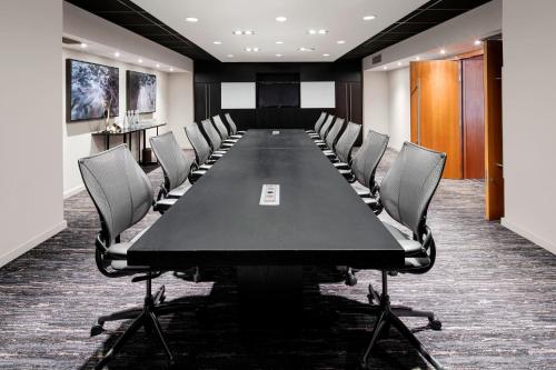 a conference room with a long table and chairs at The Westin Cape Town in Cape Town