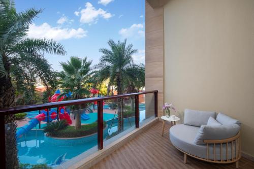 a balcony with a view of a water park at Crowne Plaza Zhoushan Seaview, an IHG Hotel in Zhoushan