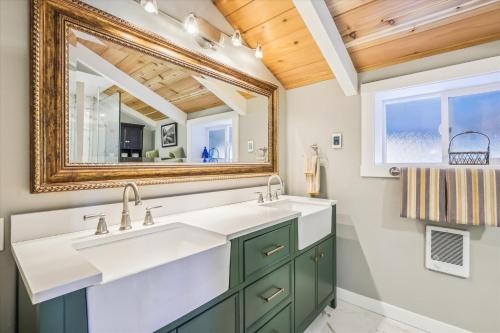 a bathroom with a sink and a mirror at Granlibakken Getaway- West Shore Retreat-Central Location-Hot Tub-Near Skiing in Tahoe City