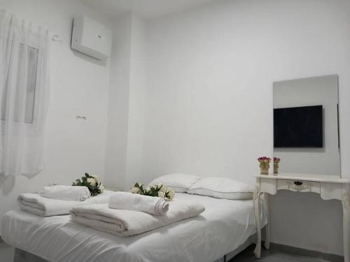 Postel nebo postele na pokoji v ubytování Luna place