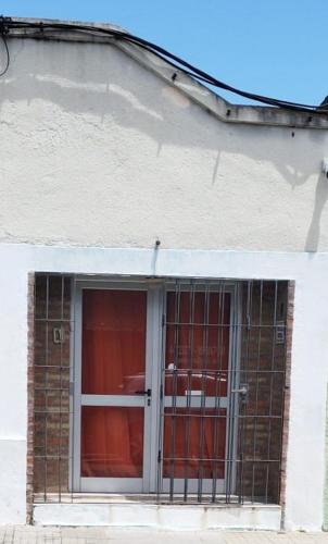 a window of a building with a metal gate at Dublin in Rocha