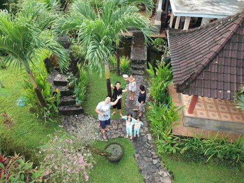 Κήπος έξω από το Villa Asri Karangasem