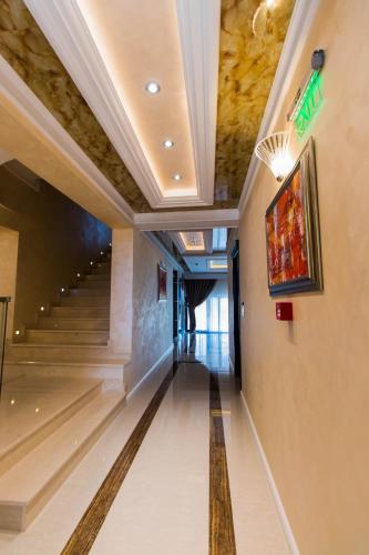 an empty hallway with stairs in a building at Hotel Bohemi in Haskovo