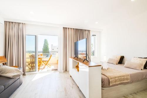 Llit o llits en una habitació de White Studio - Ocean View