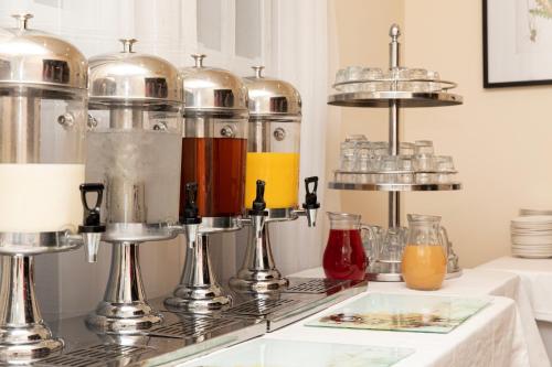 a kitchen with a counter top with two juicer at Scotland's Spa Hotel in Pitlochry