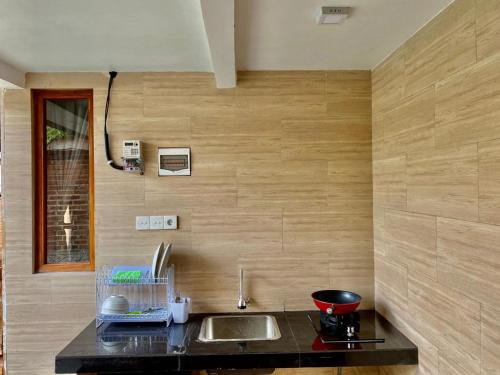 Kuchyň nebo kuchyňský kout v ubytování Sridewi Villas Ubud