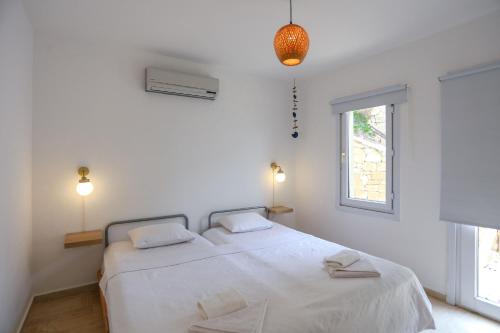 Postel nebo postele na pokoji v ubytování Sofia Apart amazing sea view