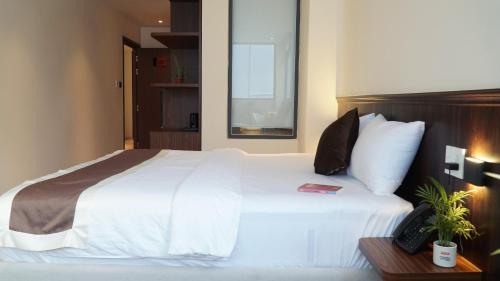 Bros Hotelにあるベッド