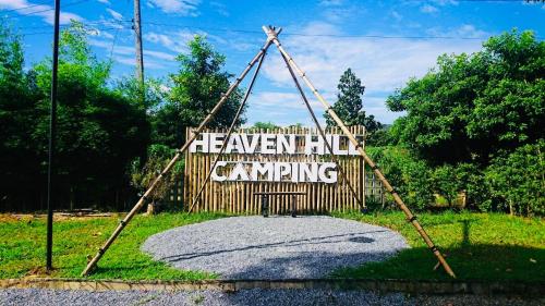 a sign that reads heaven end camping in a park at Heaven Hill Camping in Ban Thung Na