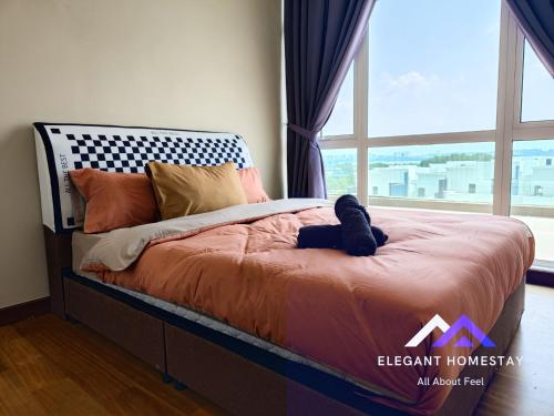 Tempat tidur dalam kamar di Paragon Residences By Elegant Johor Bahru