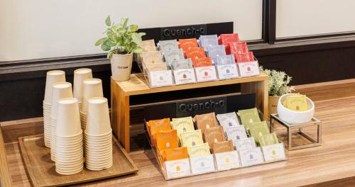 a table with a bunch of differentiatesiatesiatesiatesktop at Hotel Oriental Express Osaka Shinsaibashi in Osaka