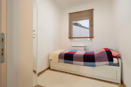 Postel nebo postele na pokoji v ubytování 1-bedroom apartment near airport