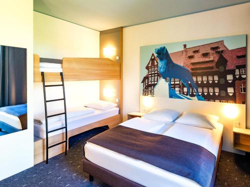 Postel nebo postele na pokoji v ubytování B&B Hotel Braunschweig-City