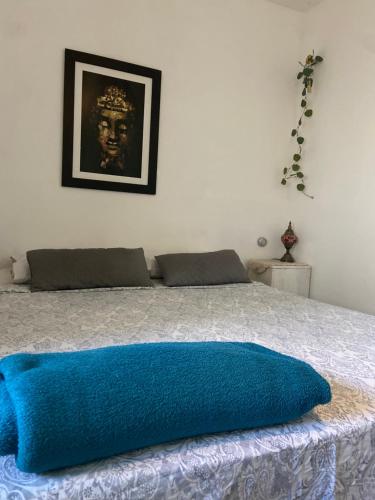 מיטה או מיטות בחדר ב-Suíte Pontal