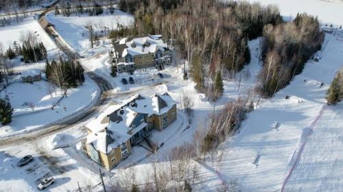 an aerial view of a house in the snow at Mont-Blanc 2 - Direct access to hiking, beach & pool at Mont-Blanc in Mont-Blanc