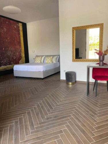 Postel nebo postele na pokoji v ubytování Residenza Agli Scavi