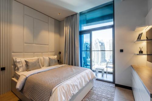 Postel nebo postele na pokoji v ubytování 1-bed apart 15 Northside Dubai