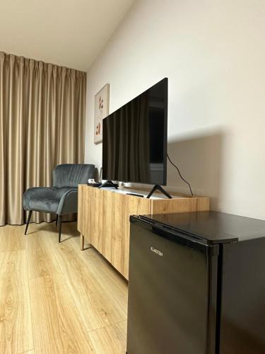 Μια τηλεόραση ή/και κέντρο ψυχαγωγίας στο Apartmány Loky