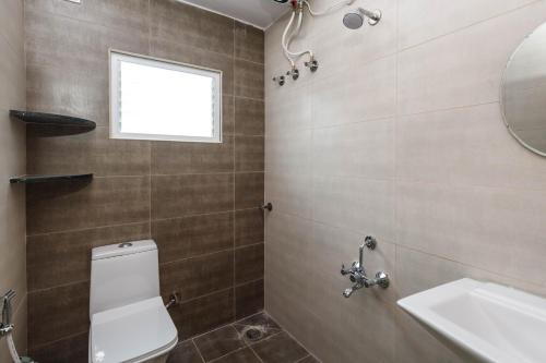 Koupelna v ubytování Elite Peak Serviced Apartments
