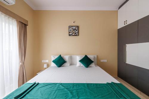 Postel nebo postele na pokoji v ubytování Elite Peak Serviced Apartments