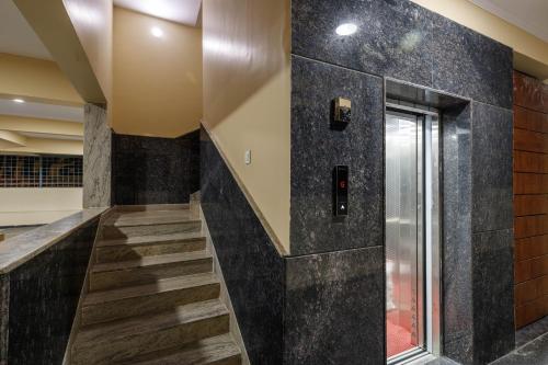 Fotografie z fotogalerie ubytování Elite Peak Serviced Apartments v destinaci Bengalúr