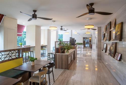 Posezení v ubytování Fraser Suites Singapore