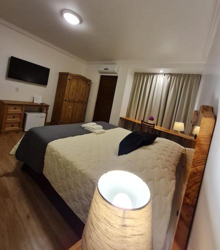 Katil atau katil-katil dalam bilik di Hotel Schneider