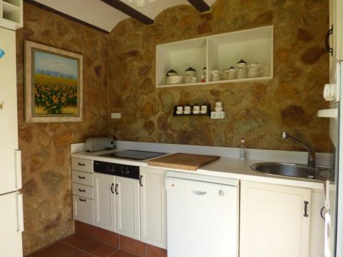 Kuchyň nebo kuchyňský kout v ubytování Villa Aguacate