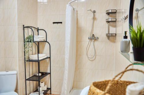 a bathroom with a shower and a toilet at Best Apartments on Kyryla & Mefodia in Mukacheve