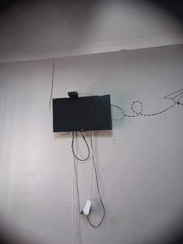 TV a/nebo společenská místnost v ubytování Prime Guest Inn