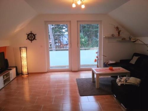 Χώρος καθιστικού στο Ferienwohnung Ostseeblick