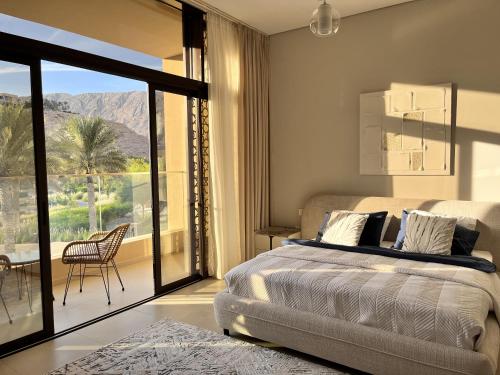 Un ou plusieurs lits dans un hébergement de l'établissement Luxury 4 bedroom Villa with Private Pool by GLOBALSTAY