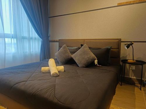 Postel nebo postele na pokoji v ubytování One Bedroom Troika Kota Bharu @ AGhome (Commoneo Theme)