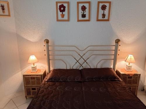 Cama ou camas em um quarto em Apto Verona Enseada Guarujá