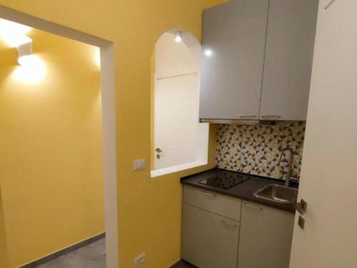 Η κουζίνα ή μικρή κουζίνα στο Stanza in Maggiore Rooms Bologna