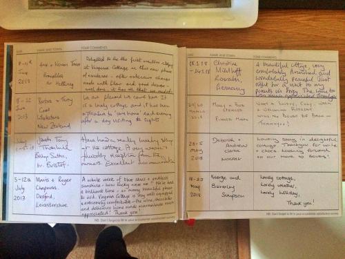 a book with handwriting on the pages of it at Finest Retreats - Little Dunley - Fig Cottage in Bovey Tracey