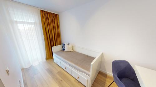 Postel nebo postele na pokoji v ubytování Apartament de Lux Sibiu VRT