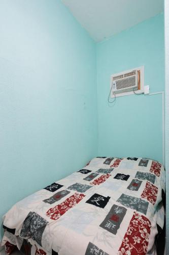 Katil atau katil-katil dalam bilik di Casa Branca 355 Familiar