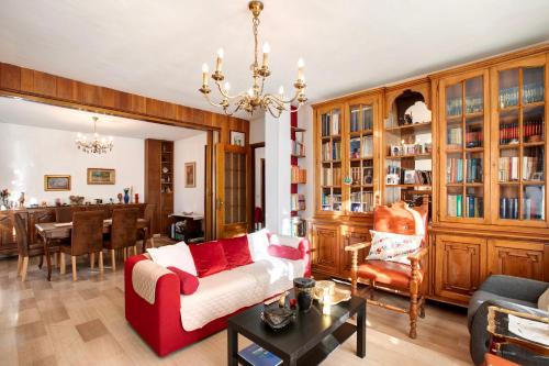 a living room with a couch and a table at Vanna House in Saint Vincent