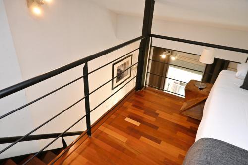 Postel nebo postele na pokoji v ubytování Homenfun Barcelona Paseo de Gracia Diagonal