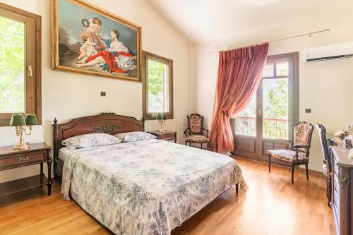 Katil atau katil-katil dalam bilik di Villa OINOI with Pool for Luxury Vacation and Events