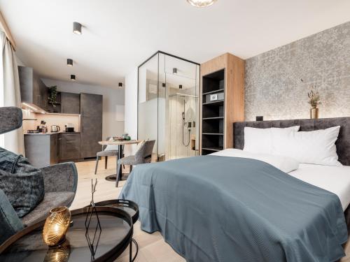 Una cama o camas en una habitación de MYALPS Tirol inklusive Summercard