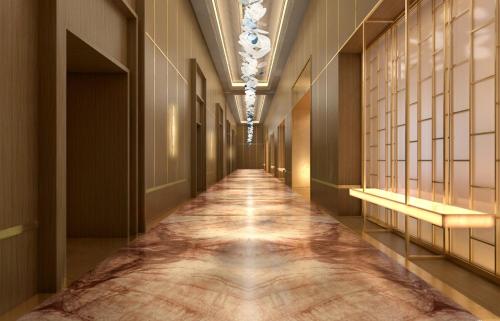 a hallway of a building with a long at Four Seasons Hotel Rabat at Kasr Al Bahr in Rabat