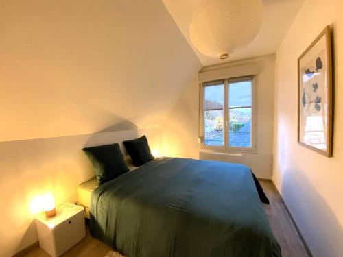 Postel nebo postele na pokoji v ubytování Plénitude Giverny-Vernon appt 12